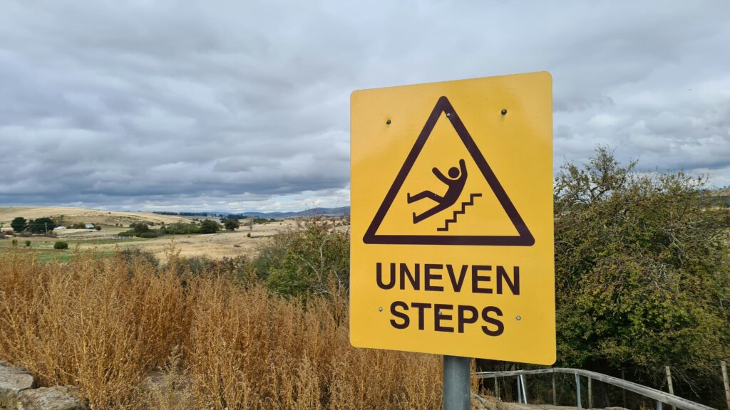 A warning sign for uneven steps