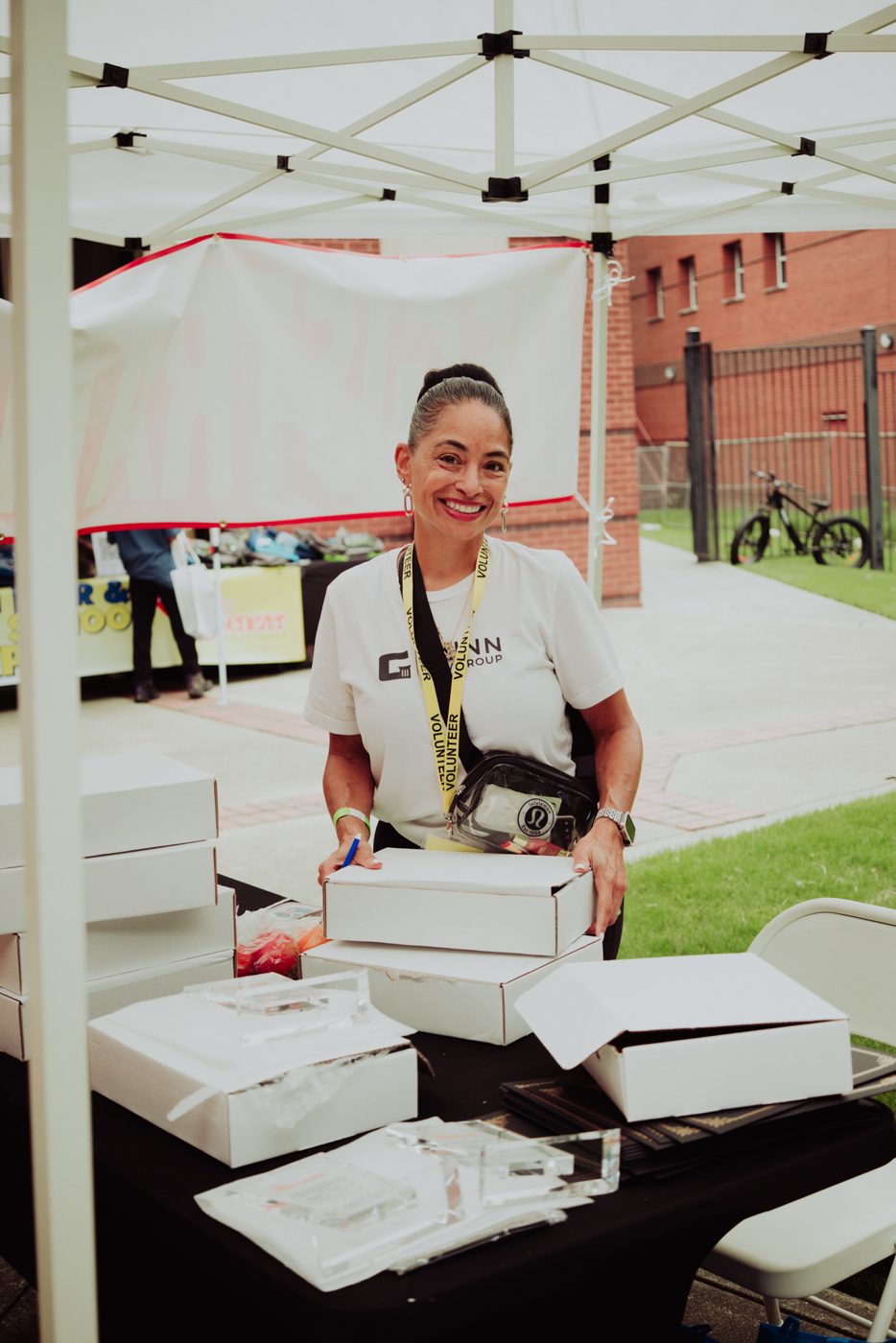 Gunn Law Group team member at the firm tent during the Ebenezer back-to-school expo